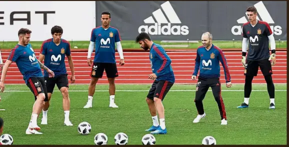  ?? — Reuters ?? Finding success: Spain’s players going through their paces during a training session in Las Rozas near Madrid yesterday. Spain will open their World Cup campaign in Group B against Portugal on June 15 in Russia.
