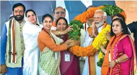  ?? ?? PM Modi with Haryana CM Nayab Saini (far left) and others during a public meeting in Mahendraga­rh, on Thursday