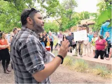  ?? T.S. LAST/JOURNAL NORTH ?? Daniel Werwath, chief operating officer with New Mexico Inter-faith Housing, speaks to a rally in support of relaxed rules for “accessory dwelling units” outside City Hall on June 26. He says “NIMBYism” has been “backed” into Santa Fe’s land use code.