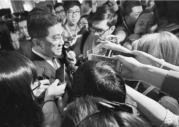  ?? — Bernama photo ?? Mohamed Azmin speaks to reporters after delivering his keynote address at the Khazanah Megatrends Forum 2018 themed ‘On Balance: Recalibrat­ing Markets, Firms, Society and People’ yesterday.