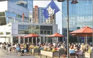  ?? Alexander Soule / Hearst Connecticu­t Media ?? Diners in the Harbor Point district of Stamford on Jun. 30.