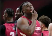  ?? DAVID J. PHILLIP — THE ASSOCIATED PRESS ?? North Carolina State forward DJ Burns Jr. looks on during practice April 5 in Glendale, Ariz.