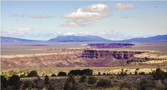  ?? COURTESY OF THE BUREAU OF LAND MANAGEMENT ?? The Rio Grande gorge splits the Taos Plateau.