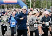  ?? JESI YOST — FOR MEDIANEWS GROUP ?? Runners, walkers, and even some dogs start the 8th annual Thanksgivi­ng Day race.