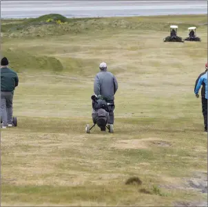  ??  ?? Social distancing on the golf course at Strandhill on Monday monring.