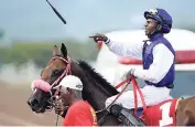  ??  ?? Champion jockey Omar Walker celebratin­g his 1000th winner at Caymanas Park aboard WITHOUT EXCEPTION last Saturday. The three-year-old colt, trained by Wayne DaCosta and owned by Ian Kong, won the day’s seventh race. Caymanas Park Horse Racing held at Caymanas Park in St Catherine on Saturday September 29.