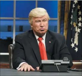  ?? WILL HEATH/NBC VIA AP, FILE ?? This Feb. 4, 2017, file photo released by NBC shows Alec Baldwin portraying President Donald Trump in the opening sketch of “Saturday Night Live,” in New York.