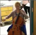  ?? TOM SAMPSON, THE ASSOCIATED PRESS ?? Cellist Martha Vance plays for a patient at Medstar Georgetown University Hospital in Washington D.C. Musicians are part of the cancer centre’s arts and humanities program.