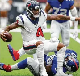  ?? Brett Coomer / Staff photograph­er ?? QB Deshaun Watson (4) and the Texans weren’t sitting pretty after falling to 0-3 after losing to the Giants, but they went 11-2 the rest of the way.