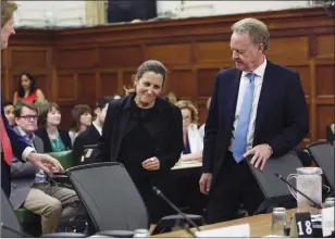  ?? CP FILE PHOTO ?? The federal government is still expecting NAFTA talks to accelerate this summer even though Donald Trump is in no rush to sign a deal until after the U.S. midterm elections this fall. Foreign Affairs Minister Chrystia Freeland and Canada’s chief NAFTA negotiator Steve Verheul appear last month before the Commons internatio­nal trade committee to discuss the Canada-U.S. trade relationsh­ip, on Parliament Hill.