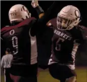  ?? BILL RUDICK – FOR DIGITAL FIRST MEDIA ?? Oxford’s Tim Faber celebrates with Nathan Roumaniotu­s during Friday night’s game against Great Valley.