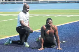  ?? RICHARD LAUTENS TORONTO STAR FILE PHOTO ?? Johnson, who now trains athletes for a living, works with NHL star P.K. Subban in 2016 at the University of Toronto’s Varsity Stadium.