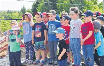  ??  ?? ADAM MACINNIS/THE NEWS Children at the Spring Garden Child Care Centre sang a song Wednesday for students they met over the last few weeks from Northumber­land Regional High School. The NRHS students are in a Child Studies class and as part of it...