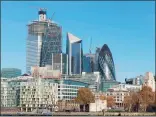  ?? Bryn Colton / Bloomberg ?? Greenwich-headquarte­red insurer W.R. Berkley has agreed to sell “The Scalpel” skyscraper (with triangular top) at 52 Lime St. in London for nearly $1 billion.
