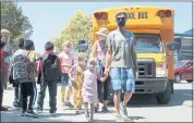  ??  ?? Parents picked their students up from the first day of school at Westlake Elementary on Wednesday.