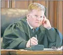  ??  ?? Judge Michael Ater listens in Ross County Common Pleas Court as Jeffrey Fisher makes his statement Monday. Not swayed by Fisher’s request for no jail time, Ater sent the former Ohio Principal of the Year to prison for two years.