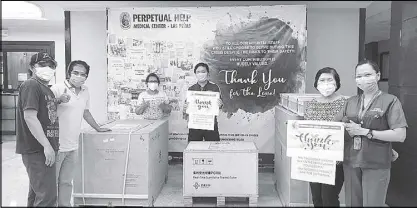  ??  ?? Perpetual Help Medical Center-Las Piñas receives polymerase chain reaction machines under the Project Antibody Rapid test Kit, a private sector initiative to boost the country’s capacity for PCRbased tests.