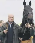  ??  ?? 0 Willie Mullins with Al Boum Photo after his 2019 success