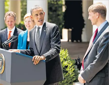 ?? Jim Watson AFP/Getty Images ?? PRESIDENT OBAMA nominates Richard Cordray, right, in 2011 to head the Consumer Financial Protection Bureau.