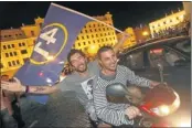  ?? Picture: REUTERS ?? NEW ORDER: Supporters of Georgian Dream coalition celebrate early election results in Tbilisi on Monday night.