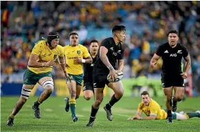  ?? GETTY IMAGES ?? All Blacks wing Rieko Iaone carves up the Wallabies during their Bledisloe Cup match in Sydney last year.