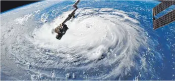  ?? FOTO: RICKY ARNOLD/NASA/AFP ?? Bedrohlich: Diese Aufnahme der Nasa von der Raumstatio­n ISS zeigt Hurricane „Florence“.