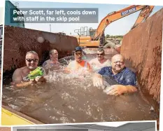  ?? ?? Peter Scott, far left, cools down with staff in the skip pool