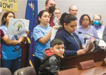  ?? AARON FLAUM/HARTFORD COURANT PHOTOS ?? Julian Osorio, 9, stands with his mom, Victoria Ramos, from the Hartford Tenants Union, during a news conference on rent control in Hartford on Tuesday. Ramos’ apartment rent jumped $225 last year.