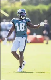  ?? CHRIS SZAGOLA, POOL — THE ASSOCIATED PRESS ?? Philadelph­ia Eagles wide receiver Jalen Reagor reacts during an NFL football practice, Tuesday, Aug. 18, 2020, in Philadelph­ia.
