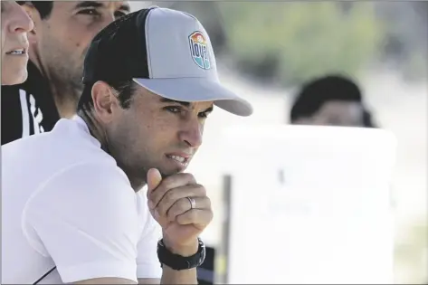  ?? AP
PHOTO/GREGORY BULL ?? In this 2020 file photo, Landon Donovan, coach of the expansion San Diego Loyal of the profession­al second-division United Soccer League, watches from the bench during a scrimmage in Chula Vista, Calif.