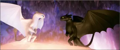  ?? DreamWorks Animation ?? The female Light Fury dragon, left, and her Night Fury paramour Toothless in “How To Train Your Dragon: The Hidden World.”