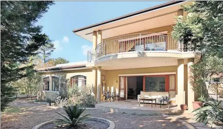  ??  ?? The Silvertree Estate property that will be auctioned by Rawson Auctions could serve as a family home, a dual-living space, work-from-home premises or two separate, two-bedroomed flats. Each floor has its own kitchen, dining and living areas, and there...