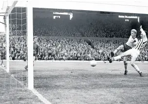  ??  ?? Fred Davies in goal as Albion’s Jeff Astle beats Graham Hawkins to the ball to fire home in October 1964