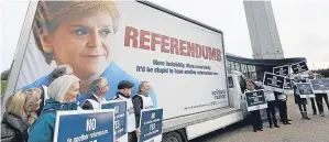 ?? Picture: Allan Milligan. ?? Pro-UK campaign group Scotland in Union unveiled its new poster at the SNP conference, warning against Nicola Sturgeon calling a “referendum­b”.