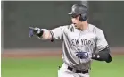  ?? PAUL RUTHERFORD/USA TODAY SPORTS ?? The Yankees’ Aaron Judge has hit a homer in three postseason games in a row.