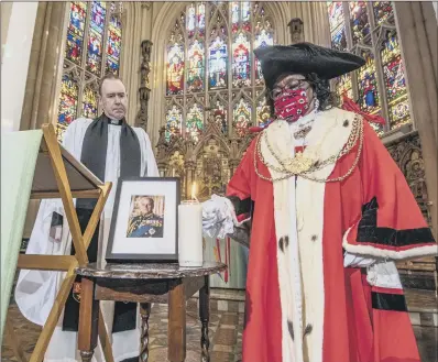  ?? PICTURE: TONY JOHNSON ?? MINSTER: The Rev Sam Corley, Rector of Leeds Minster, watches the Lord Mayor of Leeds, Eileen Taylor, at the service.