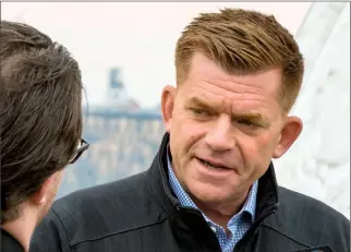  ?? @IMartensHe­rald Herald photo by Ian Martens ?? Brian Jean speaks with reporters Monday in Lethbridge as the new United Conservati­ve Party gets set to elect a leader next month.