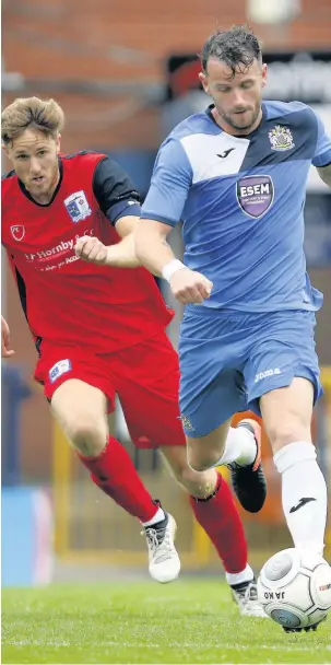  ??  ?? ●●Stockport in action against Barrow