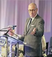  ?? Chuck Burton Associated Press ?? ESPN COMMANDS the highest subscripti­on fee in the TV business. Cord cutters have hurt the network and others. Above, ESPN President John Skipper.