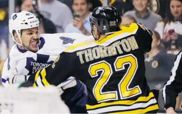  ?? JIM ROGASH/ GETTY IMAGES FILES ?? The Boston Bruins’ Shawn Thornton, in one of his many fights this year, says: “I’ve prided myself for a long time to stay within the lines. I can’t say I’m sorry enough.” He received a 15-game suspension for a Dec. 7 attack in Pittsburgh.