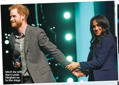  ??  ?? Meet my wife: Harry pulls Meghan on to the stage