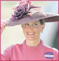  ??  ?? Countess of Wessex all in pink keeps hold of her hat