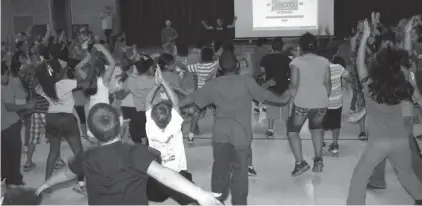  ?? Submitted photo ?? Students at De Queen Elementary School participat­e in a GoNoodle, an opportunit­y to run, stretch, dance and practice deep abdominal breathing in the classroom. GoNoodle, an interactiv­e physical classroom activity, is designed to stimulate learning and...