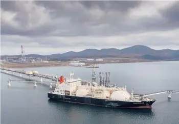  ?? AP 2021 ?? A tanker loads its cargo of liquefied natural gas from the Sakhalin-2 project in the port of Prigorodno­ye, Russia.