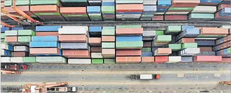  ?? Picture: REUTERS/ALEKSANDER SOLUM ?? An aerial view shows containers at the Kwai Chung Container Terminal in Hong Kong, China.