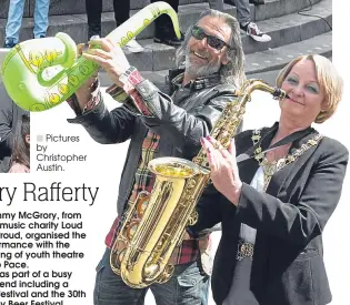  ??  ?? Tommy McGrory, from local music charity Loud and Proud, organised the performanc­e with the backing of youth theatre group Pace.
It was part of a busy weekend including a food festival and the 30th Paisley Beer Festival.
Pictures by Christophe­r Austin.