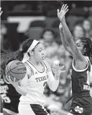  ?? Michael Wyke / Associated Press ?? Texas A&amp;M’s Chennedy Carter, left, scored 28 points in the Aggies’ loss to Mississipp­i State on Sunday.