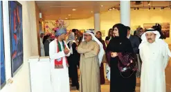  ??  ?? KUWAIT: Visitors at the Omani artists’ gallery in the Kuwait Arts Associatio­n. — KUNA