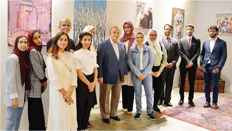  ?? Photo/Supplied ?? Saudi Arabia’s permanent representa­tive to the UN Abdallah Al-Mouallimi, center, with the exhibition’s volunteers and guests on the opening day.