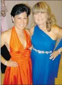  ??  ?? Nicole Bitelli in a brilliant orange Catherine Regehr dress and Deb Breen in a custom-designed blue gown rocked the Gift of Time gala.